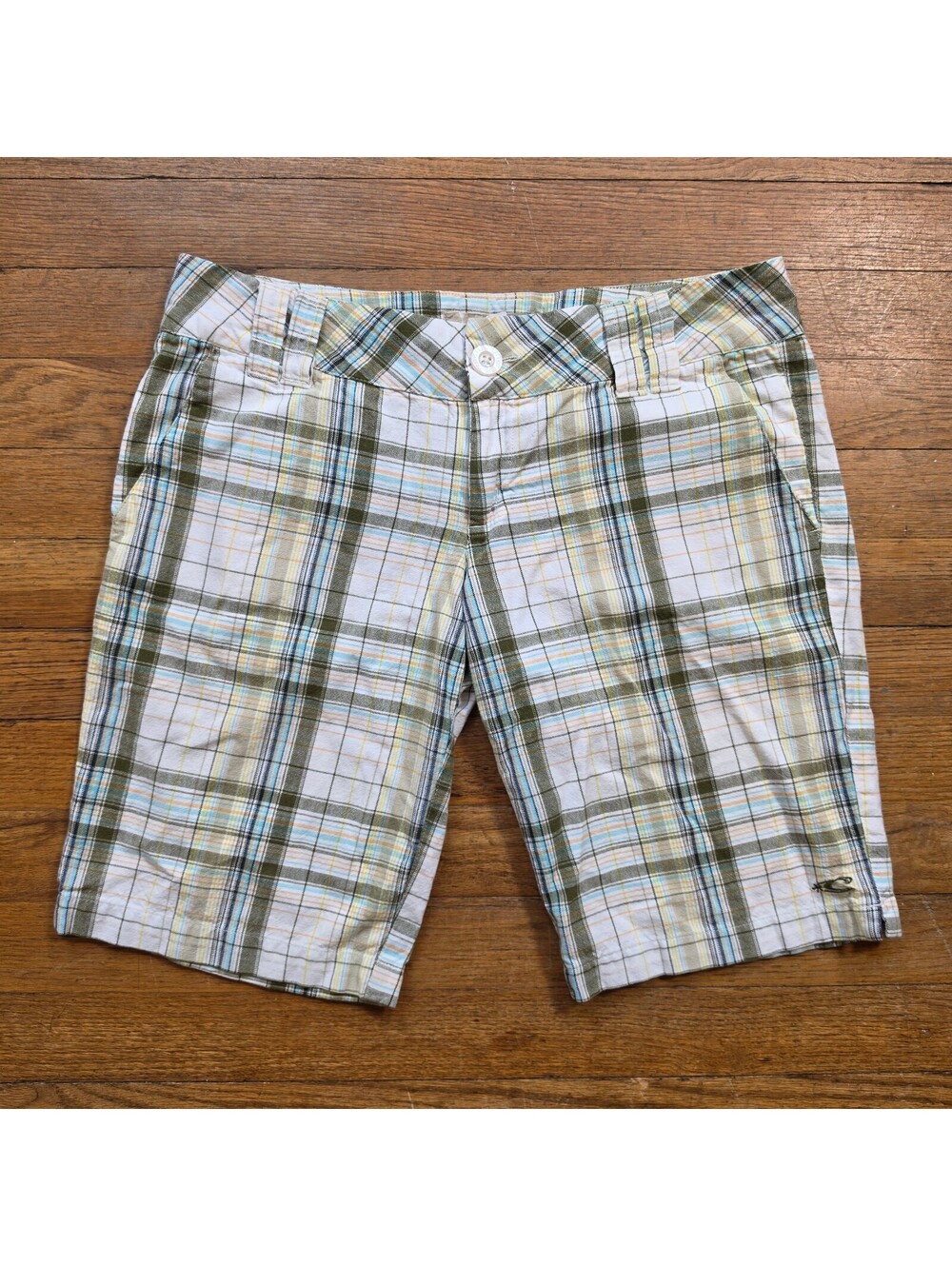 Vintage womens O'Neill green plaid shorts.